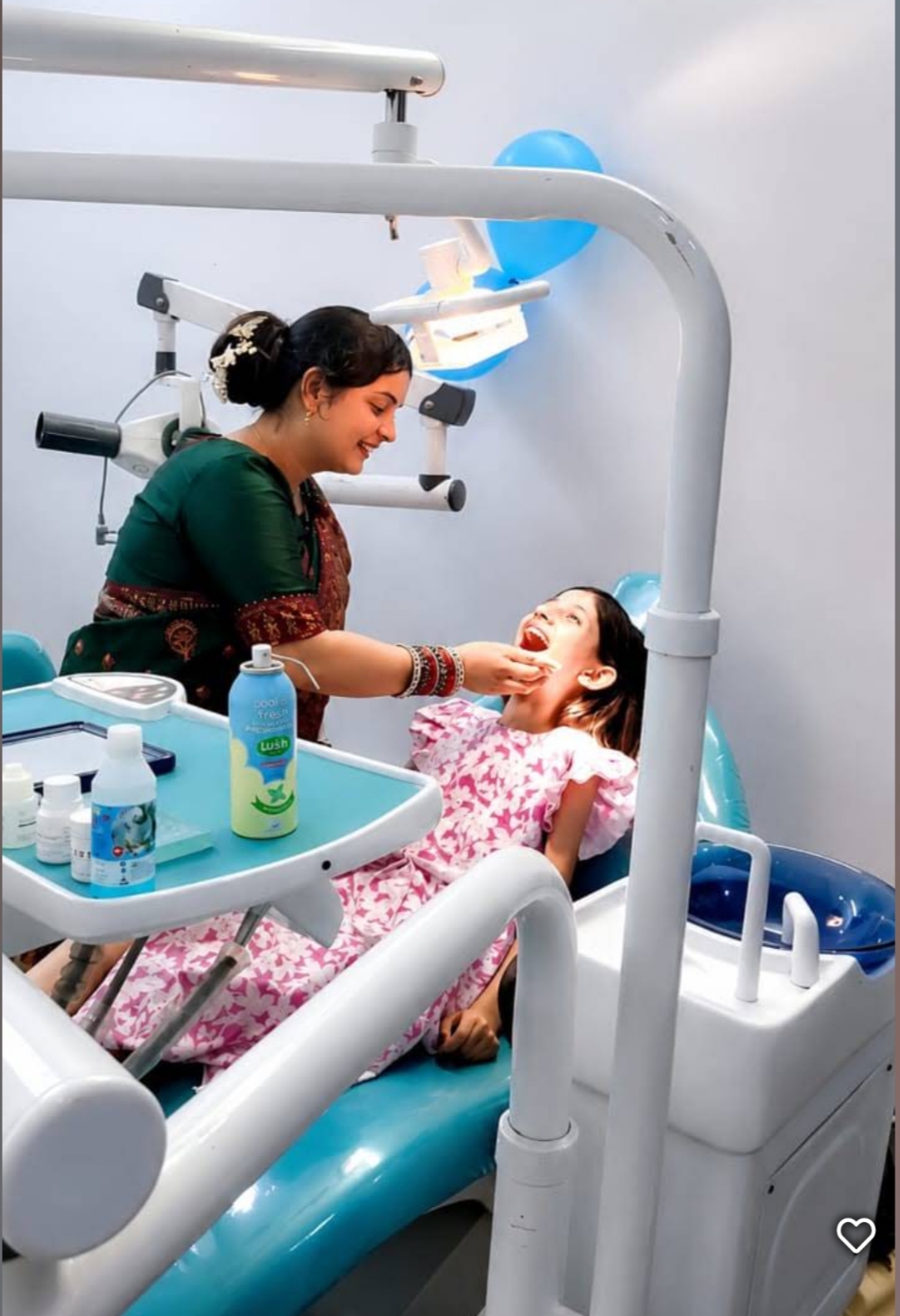 Dr. Somakshi Shukla performing a dental procedure